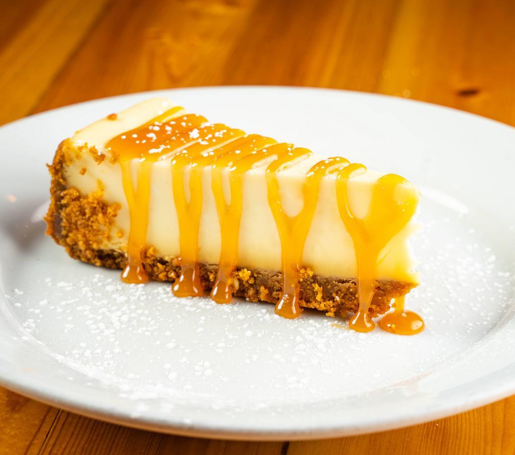 Cheesecake · New york style cheesecake with a caramel drizzle.