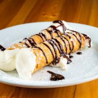 Cannoli · This classic italian pastry is filled with sweet cream and ricotta cheese topped with a choc...