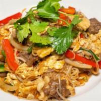 Pad Thai · Spicy stir fried noodles with (beef, chicken, shrimp) or (seafood), egg, green onion, bean s...
