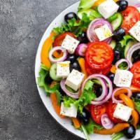 Greek Salad (Tray) · Romaine, feta cheese, tomatoes, Kalamata olives, red peppers, artichokes, pepperoncini.