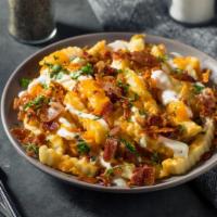 Loaded Cheddar Fries · Cheddar Cheese, Bacon, and Sliced Jalapeno.