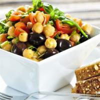 Side Salad · Romaine, Tomatoes, Garbanzos, Black Olives, Mozzarella, and Pepperoni.