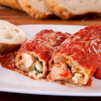 Manicotti · Filled with Ricotta cheese, baked with tomato sauce and mozzarella.