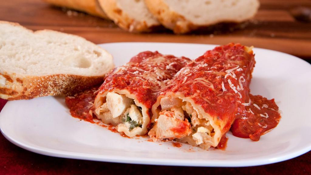 Manicotti · Filled with Ricotta cheese, baked with tomato sauce and mozzarella.