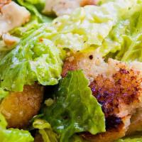 Caesar Salad · chopped romaine, caesar dressing, garlic-parmesan crumble - add chicken, salmon or shrimp fo...