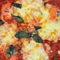 Margherita Pizza - Medium (12 Inch) · Olive Oil, Fresh Tomato, Fresh Basil, Fresh Mozzarella Cheese.