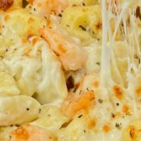 Tortellini Alfredo · Tortellini topped with Alfredo sauce and our special blend of cheeses. Your choice of chicke...