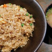Hibachi Style Fried Rice · Hibachi style fried rice with vegetables teriyaki, tossed meat & egg.