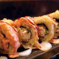 Lone Star Roll · Deep fried crawfish, cream cheese, jalapeno, crabmeat with spicy mayo, served alongside eel ...