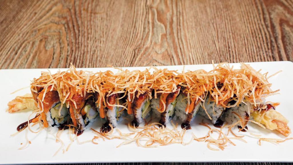 Fire Cracker Roll · Shrimp tempura, cucumber, avocado roll topped with spicy tuna and crunchy flakes served with spicy mayo and eel sauce.