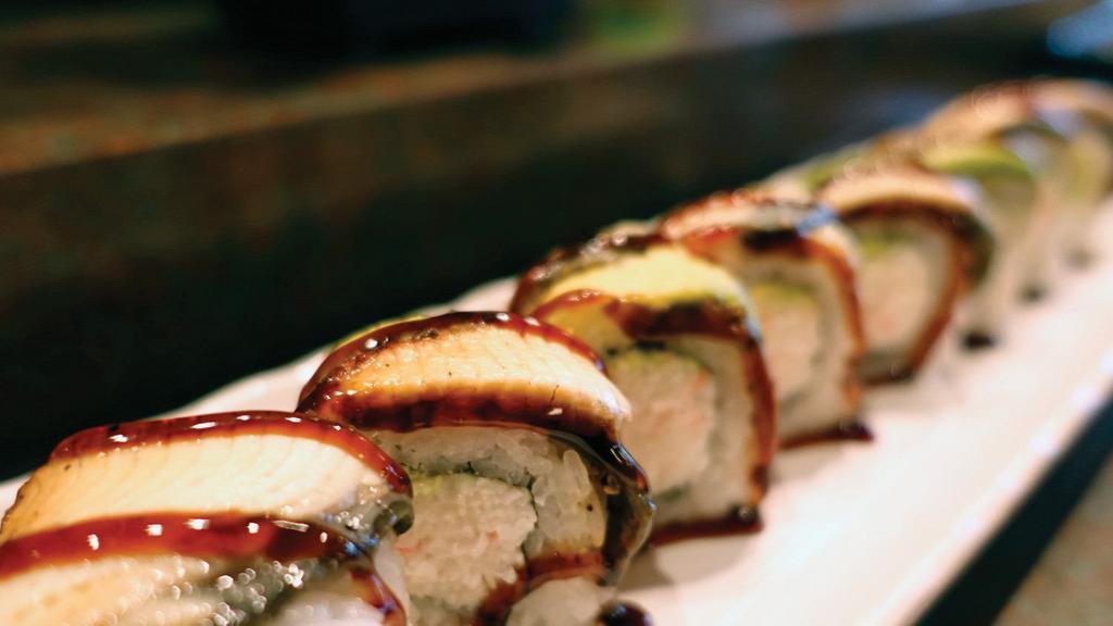 Dragon Roll · California roll topped with baked freshwater eel and avocado with eel sauce.