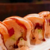 Julia'S Dream Roll · Tuna, crabmeat, avocado roll in soy paper topped with salmon with spicy mayo, eel & sweet ma...