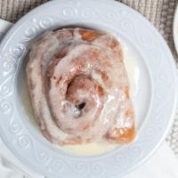 Sweet Cinnamon Roll · Sweet, yummy deliciousness. Served warm of ready to heat at home. With Icing.