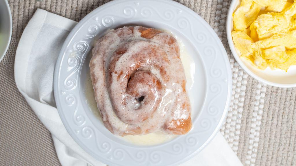 Sweet Cinnamon Roll · Sweet, yummy deliciousness. Served warm of ready to heat at home. With Icing.