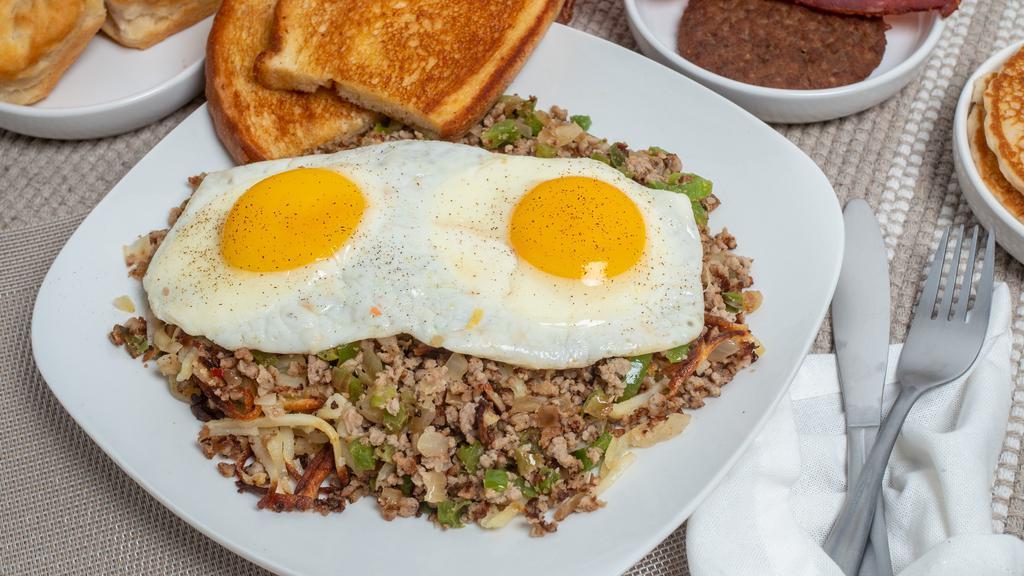 Garbage Breakfast · Hash browns, onions, bell peppers, crumbled sausage, two eggs. 760 calories.