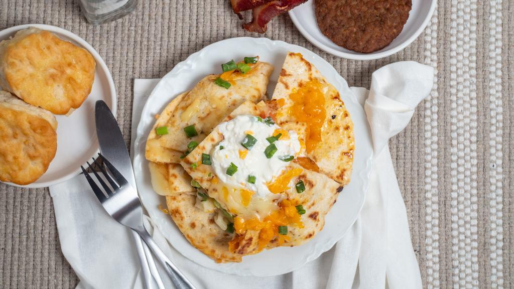 Chicken Quesadilla · Grilled tortillas, chicken breast, onions, tomatoes, cheddar and jack cheese; green onions, salsa, sour cream. Sides not included. 1260 calories.