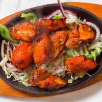 Chicken Tikka Masala · Boneless chicken white meat marinated in yogurt, skewed and cooked in special herbs and spic...