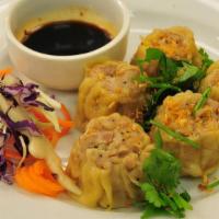 Dumpling · Chicken, shrimp and water chestnut in vegetable wrapper, served with mushroom soy sauce.  St...