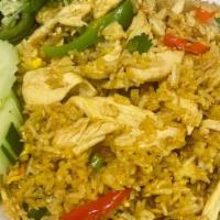 Yellow Fried Rice · Fried rice with egg, bell pepper, tomato, onion and scallions.  Can be made gluten free.