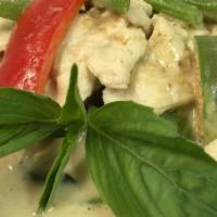 Green Curry · Hot and Spicy. Choice of meat, green curry paste, eggplant, green beans, red bell peppers, a...
