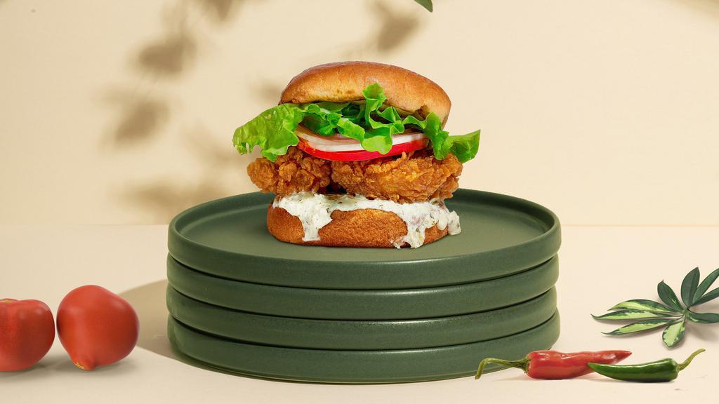 Stay Classy Chicken Sandwich · Crispy fried chicken, lettuce, tomato, onion, and house mayo sauce. Served on a warm bun.