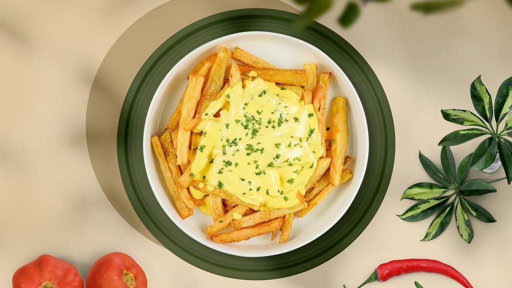 Cheesy Fries · (Idaho potato fries cooked until golden brown and garnished with salt and melted cheddar cheese.