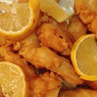Lemon Chicken · Sliced of chicken marinated in sherry, breaded and deep fried with lemon sauce.