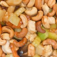 Cashew Nuts Chicken · Diced chicken garnished with cashew nuts, simmered in brown sauce.