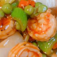 Spicy & Tangy Shrimp · Spicy. Fresh shrimp sauteed with mushroom, peas and carrots, celery and green pepper in hot ...