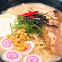 Tonkatsu Ramen · Ramen noodle in pork bone broth with pork belly, egg, fish cake, seaweed and scallions.