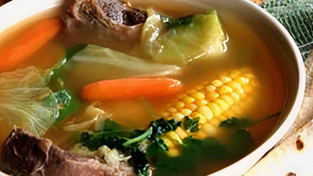 Caldo De Res · One of our oldest recipes. A variety of vegetables mixed with soup bone and beef. Served with rice.