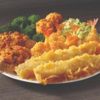 Deluxe Seafood Platter · Two fish fillets, six shrimp and two stuffed seafood crab shells. Served with hush puppies a...