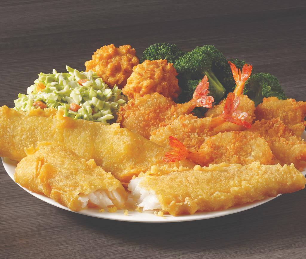 2 Pieces Fish & 6 Pieces Butterfly Shrimp · Two hand-battered fish fillets and six butterfly shrimp. Served with hush puppies and your choice of two sides.