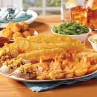 Seafood Feast Family Meal · 12 pieces of our famous batter dipped fish, 12 crispy butterfly shrimp, three seafood stuffe...