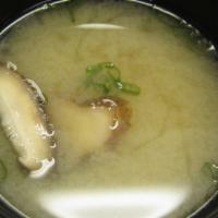 Miso Soup · Soy bean paste based broth with tofu, seaweed, and scallions.