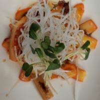 Squid Salad · Seasoned squid, sesame seeds with ponzu.