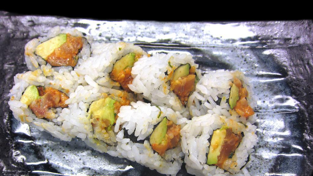 Spicy Salmon Roll · Raw, Spicy. 

Spicy salmon and avocado.