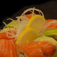 Alaskan Roll · California Roll topped with Salmon and Avocado