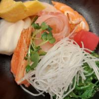Sashimi Bowl  · Tuna, Salmon, Yellowtail, Red Snapper, 
Boiled Shrimp, Seaweed Salad, Masago, 
Scallion, Rad...