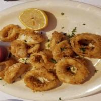 Calamari · Tender squid rings lightly battered and deep fried. Served with our tangy marinara sauce.