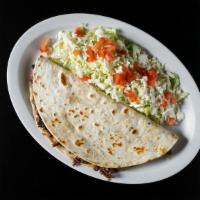 Quesadilla · Corn or flour, your choice of meat: Chicken or steak or pastor or carnitas or chorizo or tin...