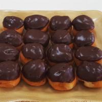 Chocolate Donut Holes · A very small donut plucked from the center of the chocolate donuts.