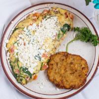 Greek Omelette · Fresh spinach, oregano, chopped tomato and feta cheese.

Consuming raw or undercooked meats,...