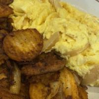Scrambled Eggs With Onions · Consuming raw or undercooked meats, poultry, seafood, shellfish or eggs may increase your ri...