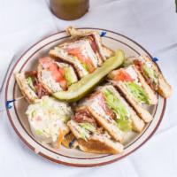 Club Sandwich · Ham or bacon, turkey, lettuce, tomato and mayo.