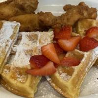 Chicken & Waffles (Savory Selections) · Belgian waffle with freshly-made chicken tenders, topped with powdered sugar and fresh straw...