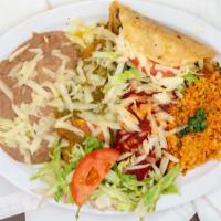 Plato Mexicano · One taco, one enchilada and one Chile relleno.
