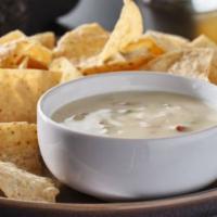 Southside Skillet Queso Blanco · Mixture of Mexican melting cheese and pico de gallo.