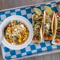 Maggie'S Street Tacos · Tajin grilled or fried chicken, shrimp or grilled steak with side of roasted street corn.