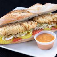 Chicken Po Boy · Lettuce Tomatoes, Onions & Remoulade Sauce.